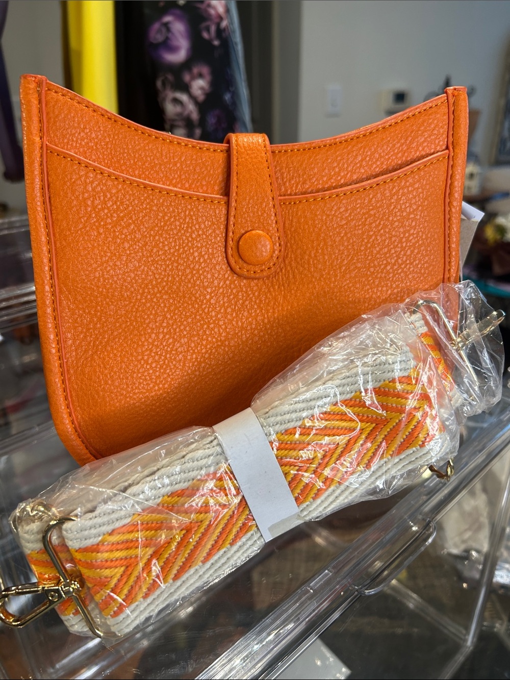 Calin Orange Pebbled Vegan Leather Crossbody with Guitar Strap 8”x 2.25”x 7” NWT